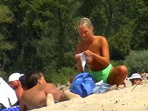 Voyeur clip of chick getting tanned